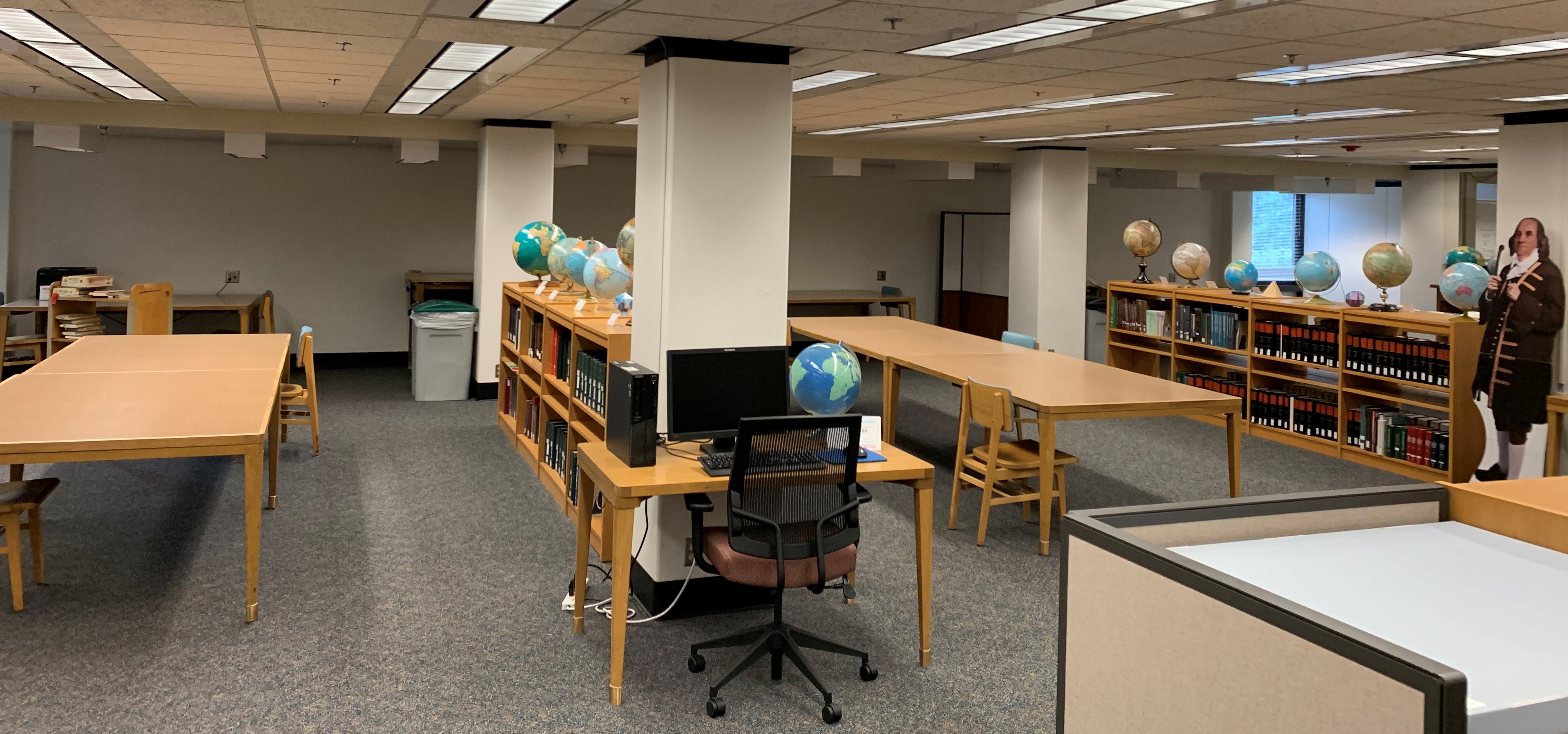 MAGIL study space with some chairs removed for social distancing