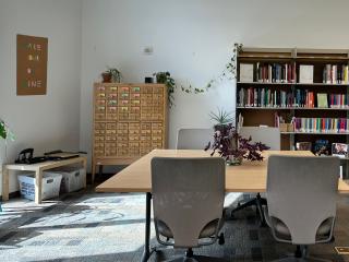 Art Library window on left, study table, colorful bookshelves