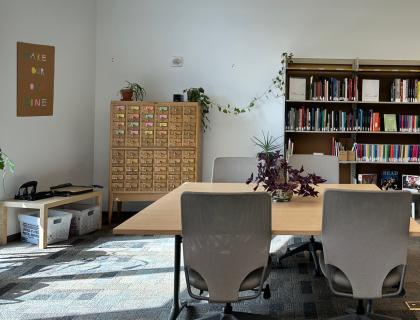 Art Library window on left, study table, colorful bookshelves