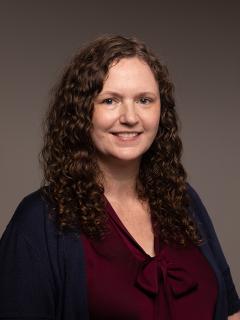 Woman with curly hair smiling